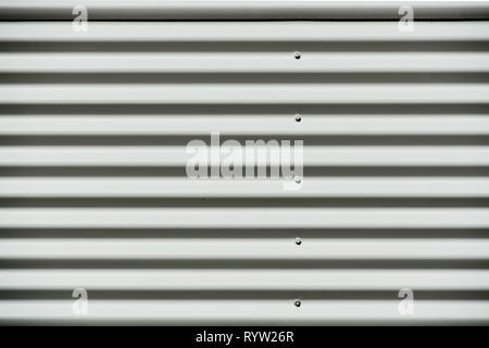 Corrugated white painted metal sheet texture Stock Photo