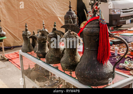 Antique traditional Arabic coffee pots on a market in Riyadh, Saudi Arabia