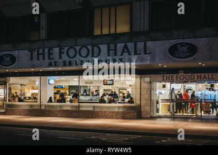 London, UK - March 9, 2019: Street view of people inside Selfridges food hall on Oxford Street, London. Selfridges is the second largest shop in the U Stock Photo