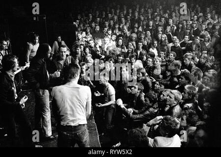 Riot during the concert of the British punk band The Clash in the Markthalle of Hamburg, Germany. 1981 Stock Photo