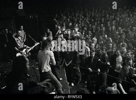 Riot during the concert of the British punk band The Clash in the Markthalle of Hamburg, Germany. 1981 Stock Photo