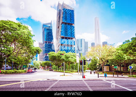Skyscrapers in the streets of Singapore. Tall buildings on background. Stock Photo
