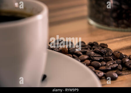Coffe cup with beans Stock Photo