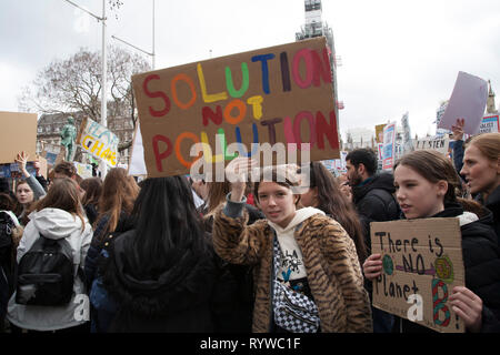 London, UK, 15 March, 2019. Students strike in Parlament Square to ask politician to make improvement to the world condition. Stock Photo