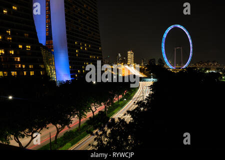 Pictured is the Singapore Flyer a giant Ferris wheel in Singapore. Stock Photo