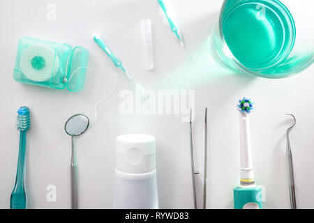 Tools for the maintenance and cleaning of the mouth on a white table.. Horizontal composition. Top view Stock Photo