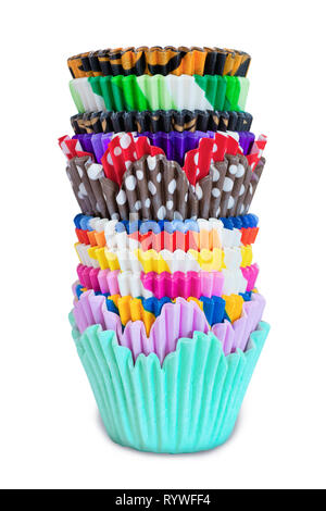Colorful cupcakes paper cases isolated on the white background. Stock Photo