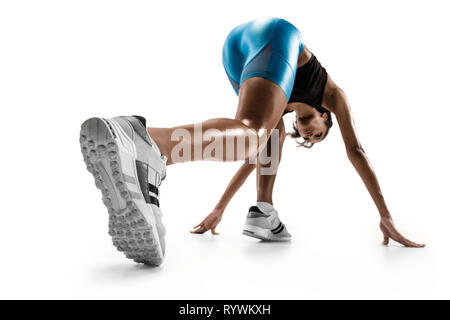 Young african woman preparing to start run isolated on white studio background. One female runner or jogger. Silhouette of jogging athlete. Stock Photo