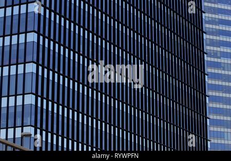 Bucharest, Romania -  October 17, 2018: Windows of tall building, in Bucharest, Romania. Stock Photo