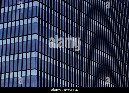 Bucharest, Romania -  October 17, 2018: Windows of tall building, in Bucharest, Romania. Stock Photo