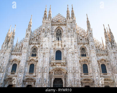 Travel to Italy - facade of Milan Cathedral (Duomo di Milano) from Piazza del Duomo in Milan city in morning