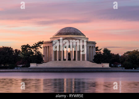 Jefferson Memorial in a beautiful sunrise with pink clouds at Washington DC National Mall Stock Photo