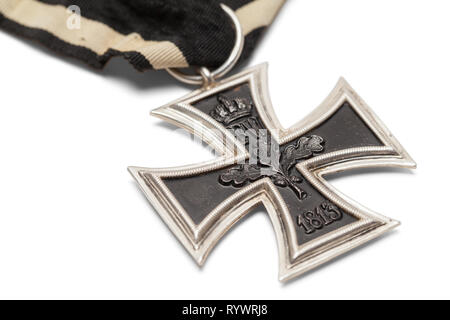 German Iron Cross Close Up Isolated on White. Stock Photo