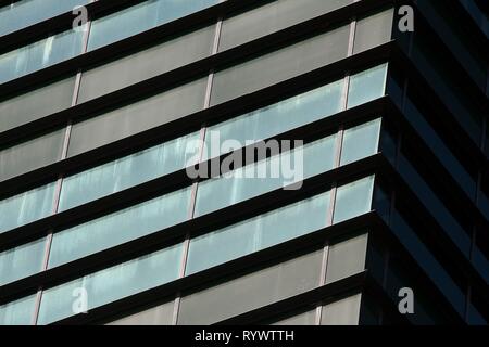Bucharest, Romania -  October 17, 2018: Windows of tall building, in Bucharest, Romania. Stock Photo