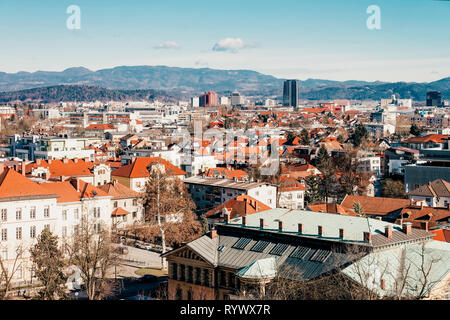 Ljubljana, Slovenia - January 15, 2019: Panoramic view on the cityscape in Ljubljana and mountains in Slovenia. Stock Photo