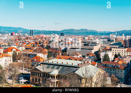 Ljubljana, Slovenia - January 15, 2019: Panoramic view of the city of Ljubljana with mountains in Slovenia. Stock Photo