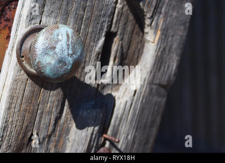 door knob on broken shed door Stock Photo