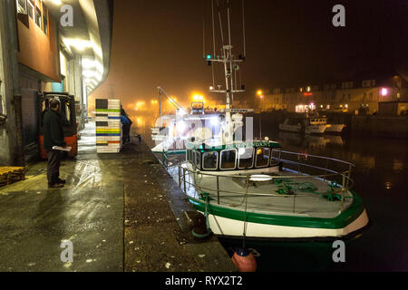 Port-en-Bessin (Normandy, north-western France): fishing boats in front of the auction room Stock Photo