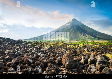 Mayon Volcano is an active stratovolcano in the Philippines. Stock Photo