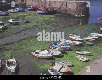 Channel Islands. Alderney.  Braye Harbour. The inner harbour at low tide. Stock Photo
