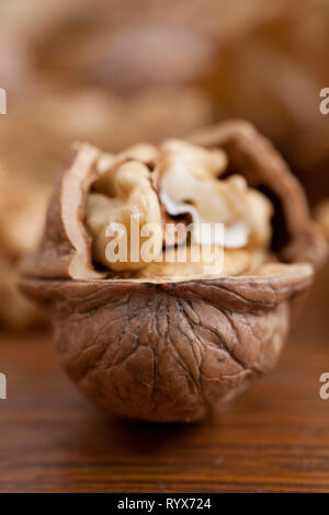 Walnuts on wooden background Stock Photo