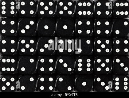 Background pattern of black dices, random ordered Stock Photo