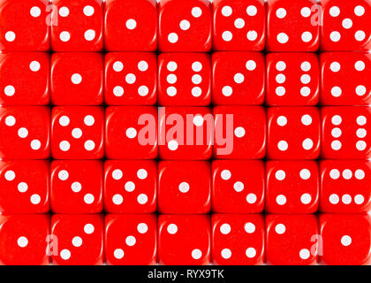 Background pattern of red dices, random ordered Stock Photo