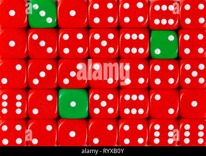 Background of random ordered red dices with three green cubes Stock Photo