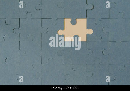 Background of blue puzzle with missing piece.Business strategy teamwork and problem solving concept. Stock Photo