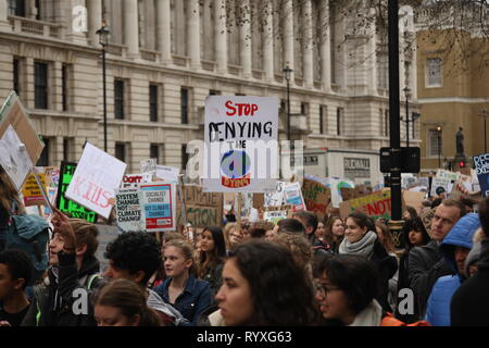 London, UK, 15th March 2019. School and college students in London take part in the second protest calling for the World’s governments to make environmental issues a priority. They have walked out of school to gather outside the Houses of Parliament, and march around the capital, stopping at Buckingham Palace. It is one of many protests taking place at the same time around the country. Roland Ravenhill/Alamy Live News. Stock Photo