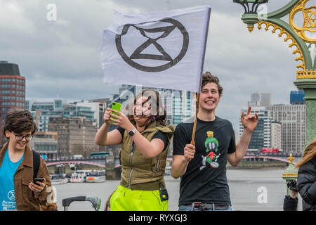 Westminster Bridge, London, UK. 15th Mar 2019. Extinction Rebellion organise a Youth After Party which blocks Westminster Bridge. The followed and was attended by School students who were striking over the lack of action on climate change. Credit: Guy Bell/Alamy Live News