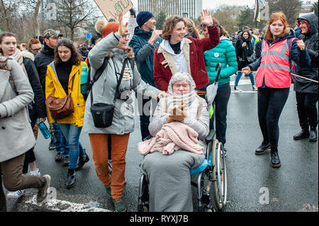 Brussels, North Brabant, Belgium. 15th Mar, 2019. Anuna de Weber, the principal organisator of the demonstration are seen walking with her mother and her grandmother during the Global climate strike for future rally. This Friday, tens of thousands of kids in more of 60 countries went on strike to demand climate change action. Credit: ZUMA Press, Inc./Alamy Live News Stock Photo