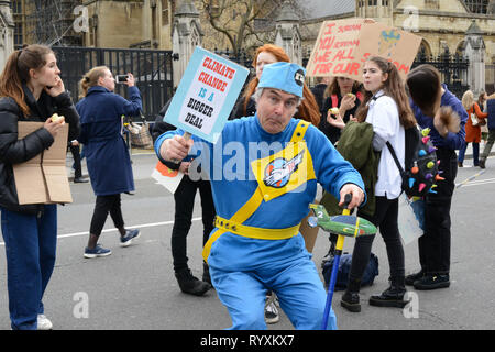 London, UK. 15th Mar, 2019. School climate strike March 15th 2019, London, Parliament Square: Swedish climate activist Greta Thunberg inspired UK students to protest climate change today by walking out of schools. Students are calling for the government to take action on global warming. Credit: Thomas Krych/Alamy Live News