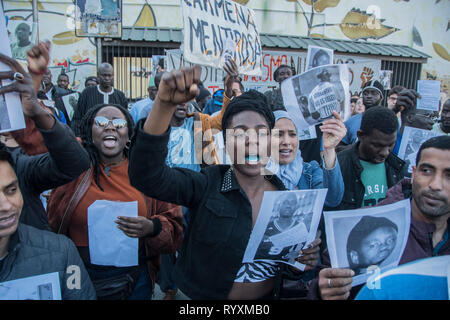 Madrid, Spain. 15th Mar 2019. March to commemorate one year of the death of senegalese vendor Mmame Mbage in Lavapies Square Nelson Mandela. one year ago there was a clashes between police and immigrants after Mmame Mbage, a Senegalese street vendor, died of a cardiac arrest allegedly after being chased by local police. Credit: Alberto Sibaja Ramírez/Alamy Live News Stock Photo