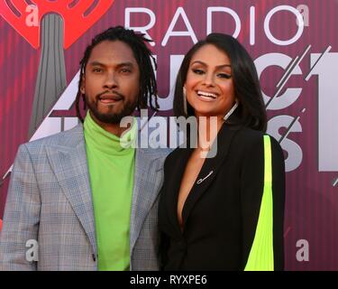 Los Angeles, CA, USA. 14th Mar, 2019. Miguel, Miguel Pimentel, Nazanin Mandi at arrivals for 2019 iHeartRadio Music Awards - Part 2, Microsoft Theater, Los Angeles, CA March 14, 2019. Credit: Priscilla Grant/Everett Collection/Alamy Live News Stock Photo