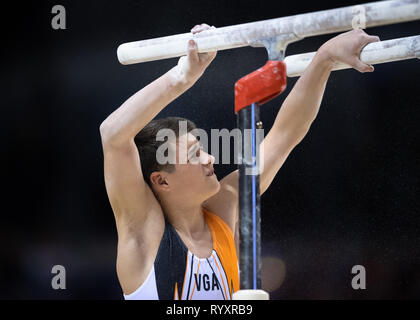Liverpool, UK. 15th Mar, 2019. Harrison Harris (Valleys GA) performs Parallel Bar in MAG Under 14, during the 2019 Gymnastics British Championships at M&S Bank Arena on Friday, 15 March 2019. LIVERPOOL ENGLAND. (Editorial use only, license required for commercial use. No use in betting, games or a single club/league/player publications.) Credit: Taka G Wu/Alamy News Credit: Taka Wu/Alamy Live News Stock Photo