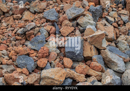 Colorful volcanic rocks texture Stock Photo