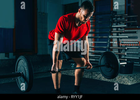 Man lifting weights. Stock Photo