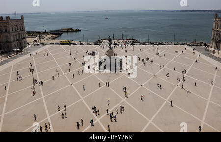Aerial view of a group of people walking in a square Stock Photo
