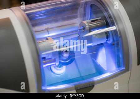 Dental ceramic reconstruction milling machine. Stock Photo