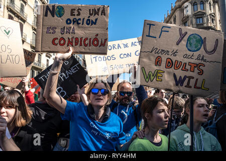 Demonstrators  are seen holding placards during the protest. Protest against climate change, Thousands of young people from around the world have mobilized with the impact of global warming convened by Fridays for future in the wake of Greta Thunberg's protests. Stock Photo