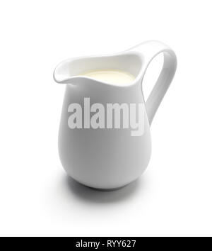 Milk or cream jug isolated on white background Stock Photo