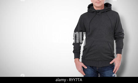 Man in black sweatshirt, black hoodies isolated on white background. mock up Stock Photo