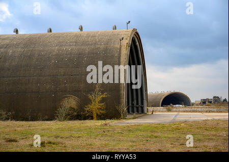 Hardened Cold War era aircraft shelters, RAF Woodbridge, Suffolk, UK. Stock Photo