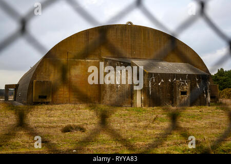 Hardened Cold War era aircraft shelters, RAF Woodbridge, Suffolk, UK. Stock Photo