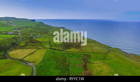 The beautiful Cliffs of Moher in an aerial view. The Cliffs of Moher are located at the southwestern edge of the Burren region in County Clare Ireland Stock Photo