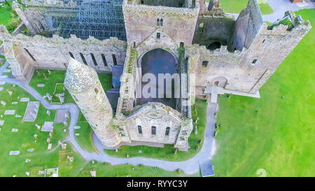 Aerial view of the inside of the Rock of Cashel where the brick walls being renovated inside the old kings castle in Ireland Stock Photo
