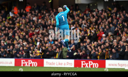 Watford goalkeeper Heurelho Gomes celebrates after Etienne Capoue (not pictured) scores his side's first goal of the game during the FA Cup quarter final match at Vicarage Road, Watford. Stock Photo