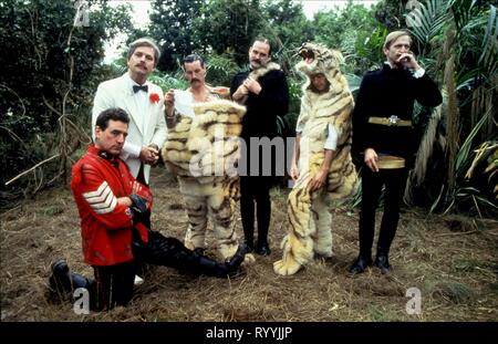 TERRY JONES, TERRY GILLIAM, MICHAEL PALIN, JOHN CLEESE, ERIC IDLE, GRAHAM CHAPMAN, MONTY PYTHON'S THE MEANING OF LIFE, 1983 Stock Photo