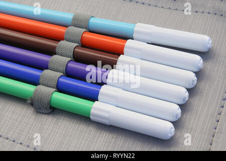 Colorful felt pens in a pencil box. Felt pens in a row. Felt pen storage. Stock Photo